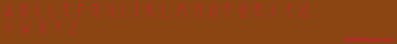 Reynoldscaps Font – Red Fonts on Brown Background