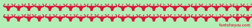Fonte Themusclefetish – fontes vermelhas em um fundo verde