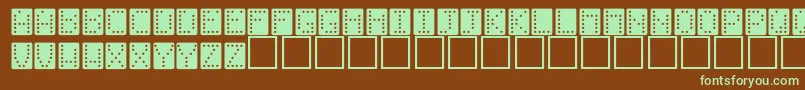 DionnaRegular-fontti – vihreät fontit ruskealla taustalla