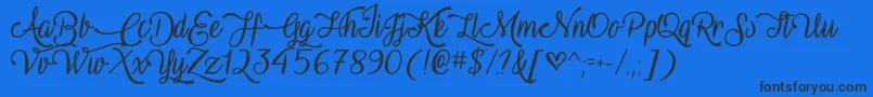 VampireCalligraphyOtf Font – Black Fonts on Blue Background