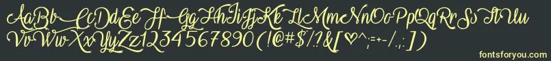 VampireCalligraphyOtf Font – Yellow Fonts on Black Background