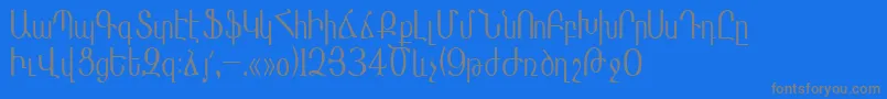フォントMasisnihar – 青い背景に灰色の文字
