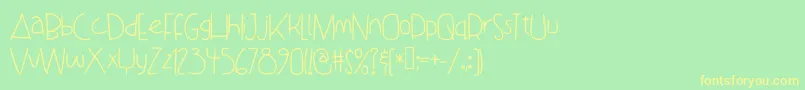 DanceWithMeTata Font – Yellow Fonts on Green Background