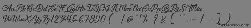Шрифт CapinellaOuBeaujoais – чёрные шрифты на сером фоне