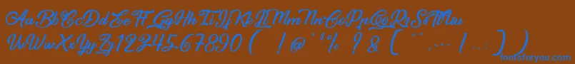 CapinellaOuBeaujoais Font – Blue Fonts on Brown Background