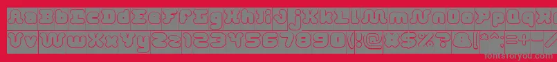 フォントDayDreamerHollowInverse – 赤い背景に灰色の文字