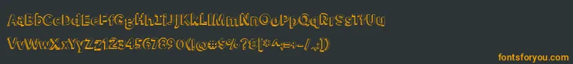 フォントBmdMeatloaf – 黒い背景にオレンジの文字