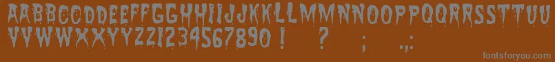 ZreaksNfi Font – Gray Fonts on Brown Background