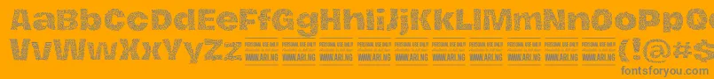 Czcionka HierografpatternPersonal – szare czcionki na pomarańczowym tle