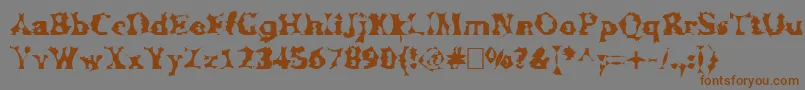 Manslem Font – Brown Fonts on Gray Background