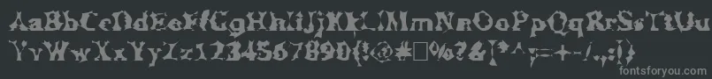 フォントManslem – 黒い背景に灰色の文字