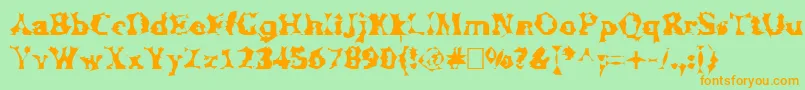 フォントManslem – オレンジの文字が緑の背景にあります。