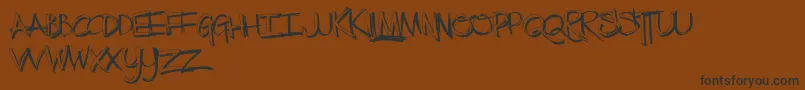 TheLowDown Font – Black Fonts on Brown Background