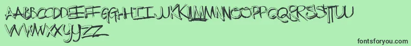 fuente TheLowDown – Fuentes Negras Sobre Fondo Verde