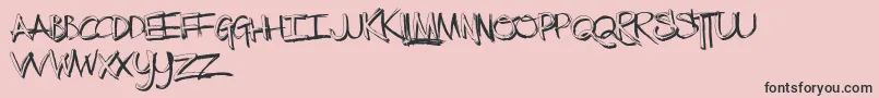 TheLowDown-Schriftart – Schwarze Schriften auf rosa Hintergrund