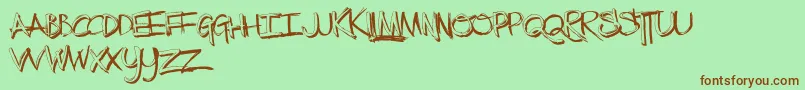 TheLowDown-Schriftart – Braune Schriften auf grünem Hintergrund