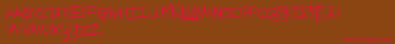 TheLowDown Font – Red Fonts on Brown Background
