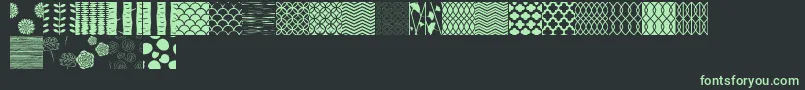 Шрифт PeoniPatterns – зелёные шрифты на чёрном фоне