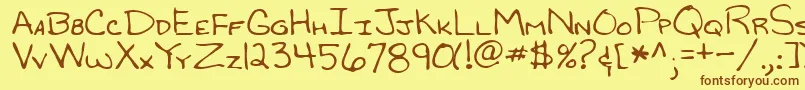 フォントRandyRegular – 茶色の文字が黄色の背景にあります。