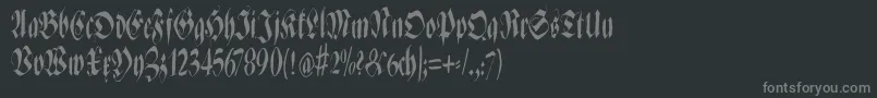 フォントZenfraxfreestylecondensed – 黒い背景に灰色の文字