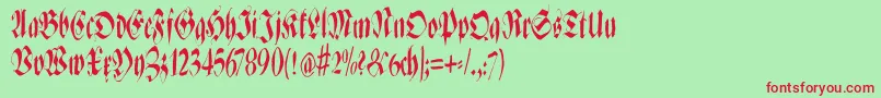フォントZenfraxfreestylecondensed – 赤い文字の緑の背景