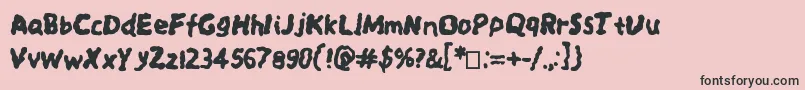 Spookysquiggles-Schriftart – Schwarze Schriften auf rosa Hintergrund