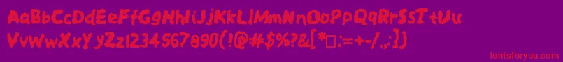 Spookysquiggles Font – Red Fonts on Purple Background