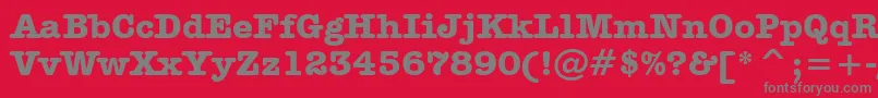 AmericanTypewriterBoldBt-fontti – harmaat kirjasimet punaisella taustalla