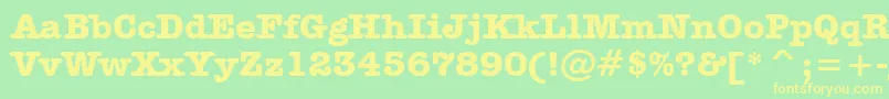 AmericanTypewriterBoldBt-fontti – keltaiset fontit vihreällä taustalla