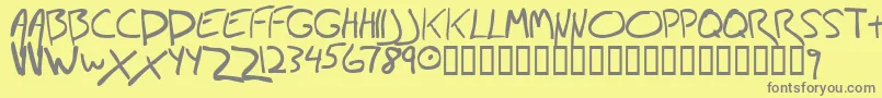 フォントJon – 黄色の背景に灰色の文字