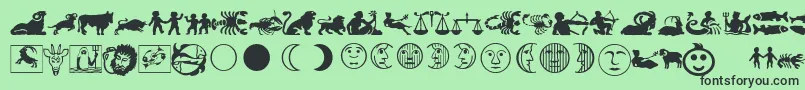 Fonte LinotypeAstrologyPiTwo – fontes pretas em um fundo verde