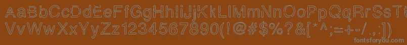 Simplychalky-fontti – harmaat kirjasimet ruskealla taustalla