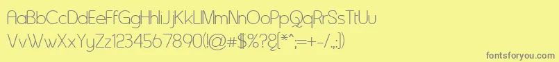 Czcionka Asenine ffy – szare czcionki na żółtym tle