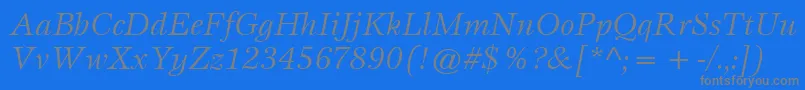 Fonte ItcEspritLtBookItalic – fontes cinzas em um fundo azul