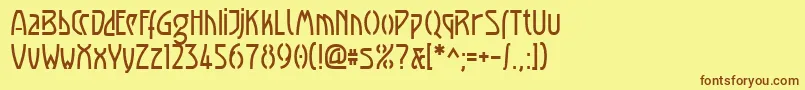 フォントLuxembourg1910 – 茶色の文字が黄色の背景にあります。