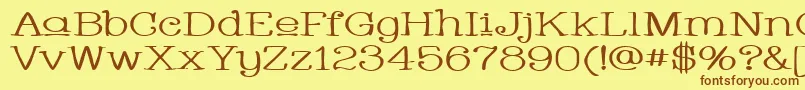 フォントWhackadooUpperWide – 茶色の文字が黄色の背景にあります。