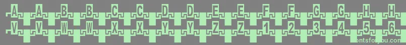 フォントZipperRus – 灰色の背景に緑のフォント