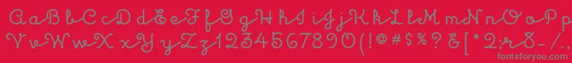 フォントKulukundisitcTt – 赤い背景に灰色の文字