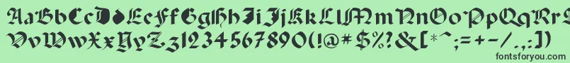 フォントCapinini – 緑の背景に黒い文字