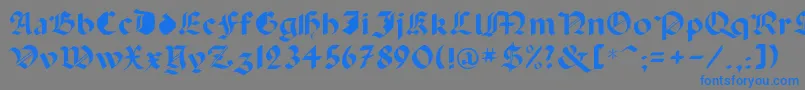 フォントCapinini – 灰色の背景に青い文字