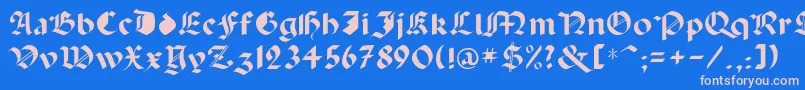 フォントCapinini – ピンクの文字、青い背景