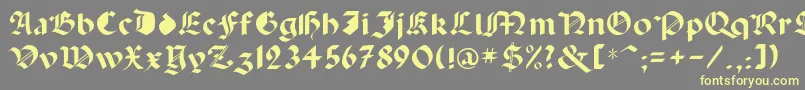 Capinini Font – Yellow Fonts on Gray Background