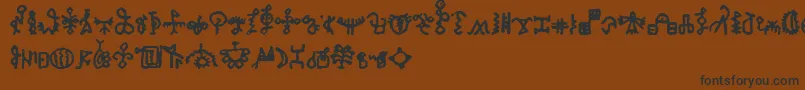 Czcionka BamumSymbols1 – czarne czcionki na brązowym tle