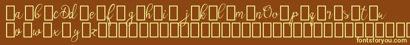 OlyberDemo-fontti – keltaiset fontit ruskealla taustalla