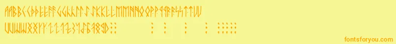 フォントRunicaltnoc – オレンジの文字が黄色の背景にあります。