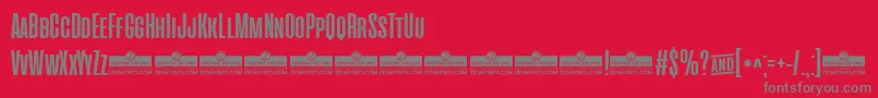 Czcionka CinematograficaBoldTrial – szare czcionki na czerwonym tle