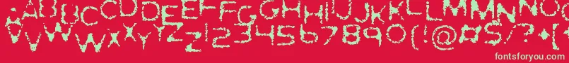 GhostlyPrints-Schriftart – Grüne Schriften auf rotem Hintergrund