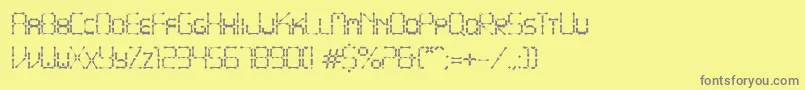 フォントPointyIronFence – 黄色の背景に灰色の文字