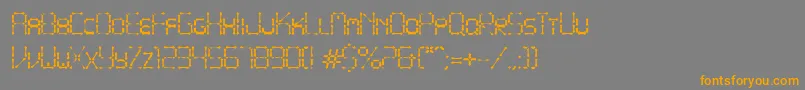 フォントPointyIronFence – オレンジの文字は灰色の背景にあります。
