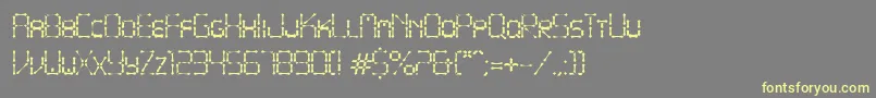 PointyIronFence-fontti – keltaiset fontit harmaalla taustalla